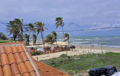 Imagem: A casa possui 3 Dormitórios, 3 Banheiros, 5 Vagas na garagem