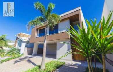 Imagem: A casa em condomínio possui 4 Dormitórios, 5 Banheiros, 4