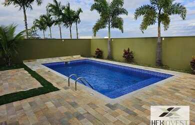 Imagem: A casa em condomínio possui 4 Dormitórios, 5 Banheiros, 4