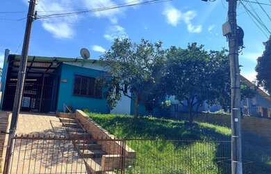 Imagem: A casa possui 2 Dormitórios, 1 Banheiro, 1 Vaga na garagem