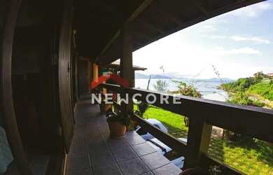 Imagem: A casa possui 5 Dormitórios, 5 Banheiros, 2 Vagas na garagem