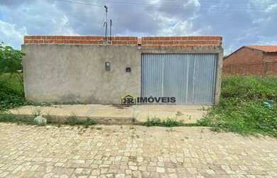 Imagem: A casa possui 2 Dormitórios, 2 Banheiros, 2 Vagas na garagem