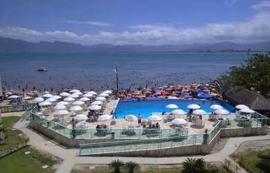 Imagem 4: Aluga temporada apartamento pé na areia com piscina borda infinita