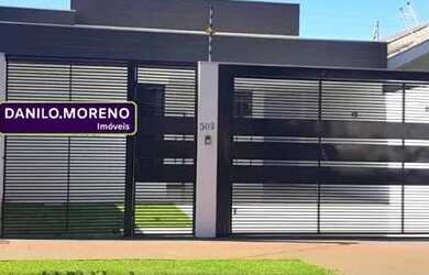 Imagem: A casa possui 3 Dormitórios, 3 Banheiros, 4 Vagas na garagem