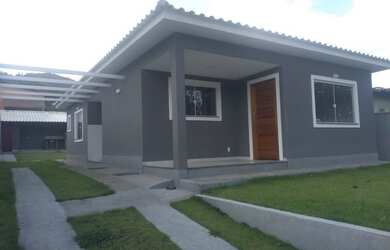 Imagem: A casa possui 3 Dormitórios, 3 Banheiros, 3 Vagas na garagem