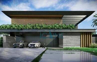 Imagem: A casa em condomínio possui 4 Dormitórios, 5 Banheiros, 572m²