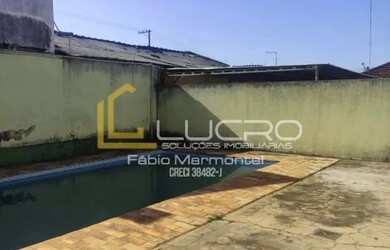 Imagem: A casa possui 5 Dormitórios, 3 Banheiros, 5 Vagas na garagem