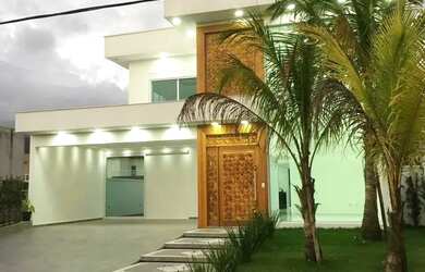 Imagem: A casa possui 5 Dormitórios, 5 Banheiros, 4 Vagas na garagem