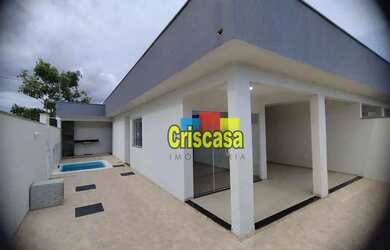 Imagem: A casa possui 2 Dormitórios, 1 Banheiro, 2 Vagas na garagem