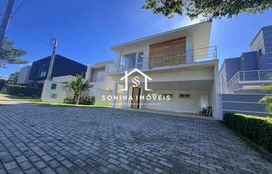 Imagem: A casa à venda possui 4 Dormitórios, 5 Banheiros, 4 Vagas