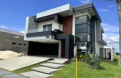 Imagem: A casa em condomínio possui 4 Dormitórios, 5 Banheiros, 4