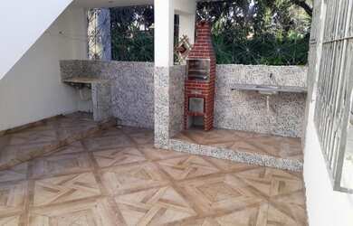 Imagem: A casa possui 2 Dormitórios, 1 Banheiro, 60m² de Área, Churrasqueira