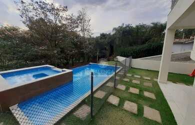 Imagem: A casa em condomínio possui 4 Dormitórios, 5 Banheiros, 4