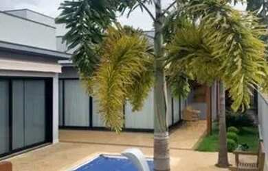 Imagem: A casa possui 3 Dormitórios, 4 Banheiros, 4 Vagas na garagem