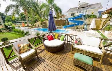 Imagem: A casa possui 3 Dormitórios, 2 Banheiros, 3 Vagas na garagem