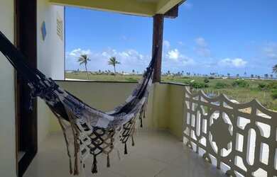 Imagem: A casa possui 4 Dormitórios e 5 Vagas na garagem e está localizado