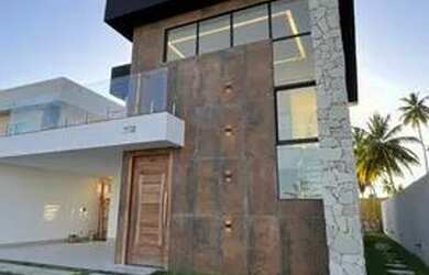 Imagem: A casa possui 3 Dormitórios, 3 Banheiros, 4 Vagas na garagem