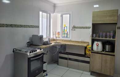 Imagem: A casa possui 3 Dormitórios, 3 Banheiros, 3 Vagas na garagem