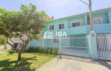 Imagem: A casa possui 3 Dormitórios, 3 Banheiros, 2 Vagas na garagem