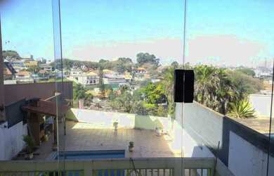 Imagem: A casa possui 3 Dormitórios, 5 Banheiros, 5 Vagas na garagem