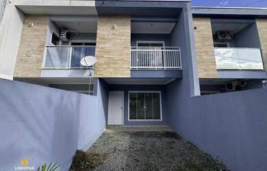 Imagem: A casa possui 2 Dormitórios, 3 Banheiros, 1 Vaga na garagem