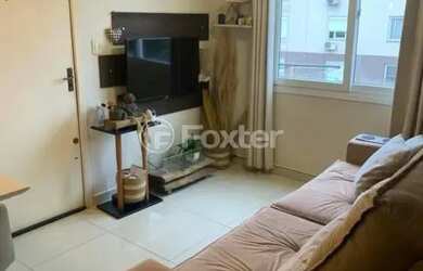 Imagem: O apartamento possui 2 Dormitórios, 1 Banheiro, 2 Vagas na