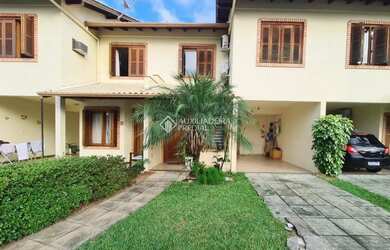 Imagem: A casa em condomínio possui 3 Dormitórios, 2 Banheiros, 2