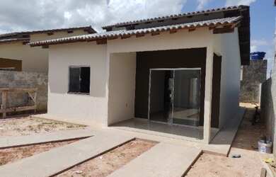 Imagem: A casa possui 2 Dormitórios, 1 Suíte, 2 Banheiros, 3 Vagas