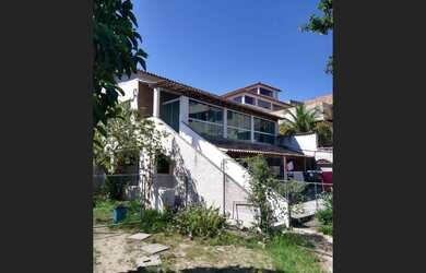 Imagem: A casa possui 2 Dormitórios, 1 Suíte, 2 Banheiros, 1 Vaga