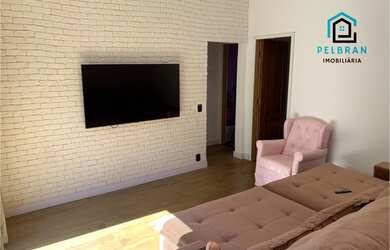 Imagem: A casa possui 6 Dormitórios, 3 Banheiros, 14 Vagas na garagem