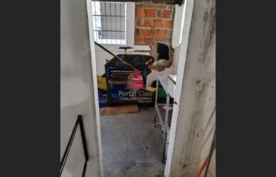 Imagem: A casa possui 2 Dormitórios, 1 Banheiro, 1 Vaga na garagem