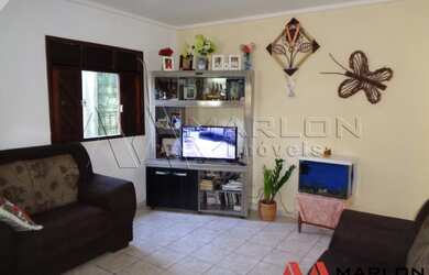 Imagem: A casa possui 3 Dormitórios, 2 Suítes, 3 Banheiros, 2 Vagas