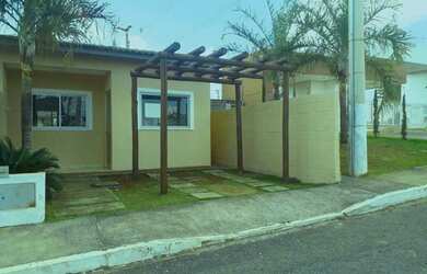 Imagem: A casa possui 2 Dormitórios, 1 Banheiro, 2 Vagas na garagem