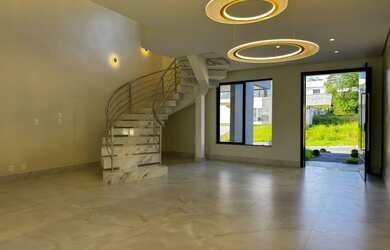 Imagem: A casa em condomínio possui 3 Suítes, 4 Vagas na garagem