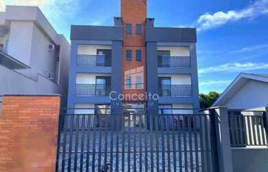 Imagem: O apartamento possui 2 Dormitórios, 1 Suíte, 2 Banheiros