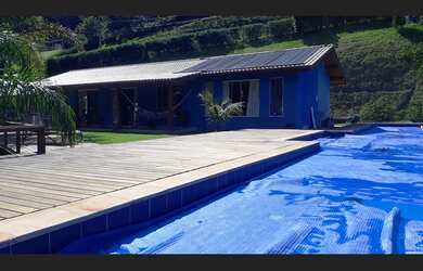 Imagem: A casa em condomínio à venda possui 4 Dormitórios, 3 Suítes