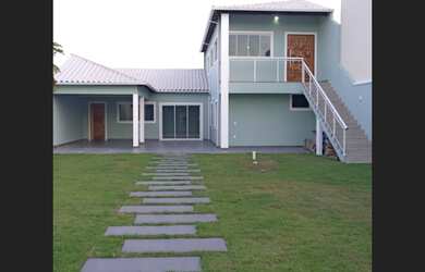 Imagem: A casa possui 2 Dormitórios, 1 Banheiro, 1 Vaga na garagem