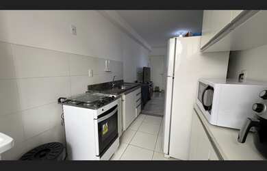 Imagem: O apartamento possui 2 Dormitórios, 1 Banheiro, 1 Vaga na garagem