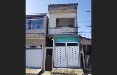 Imagem: A casa possui 2 Dormitórios, 2 Banheiros, 1 Vaga na garagem