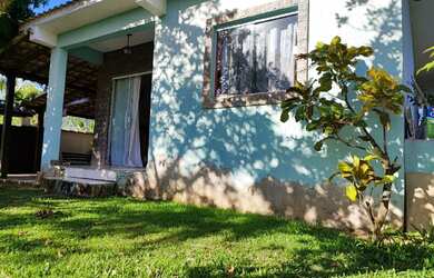 Imagem: A casa possui 2 Dormitórios, 1 Suíte, 3 Banheiros e está