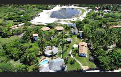 Imagem: A pousada chalé possui 6 Suítes, 12 Banheiros, 6.900m² de