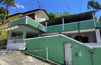 Imagem: A casa possui 2 Dormitórios, 1 Suíte, 2 Banheiros, 1 Vaga