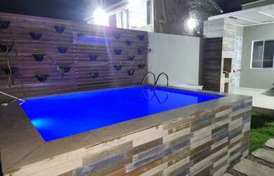 Imagem: A casa possui 1 Dormitório, 1 Suíte, 2 Banheiros, 2 Vagas