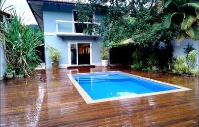 Imagem: A casa possui 2 Dormitórios, 2 Suítes, 4 Banheiros, 4 Vagas