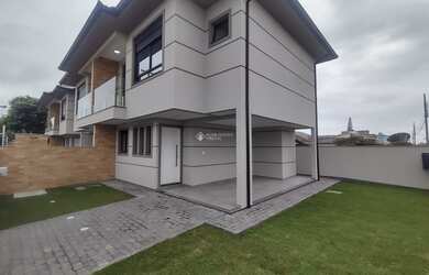 Imagem: A casa possui 3 Dormitórios, 1 Suíte, 2 Banheiros, 1 Vaga