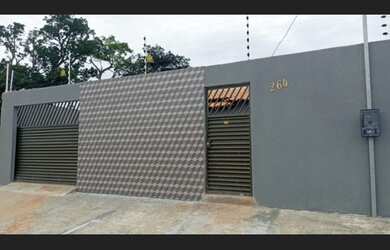 Imagem: A casa possui 2 Dormitórios, 1 Suíte, 2 Banheiros, 2 Vagas