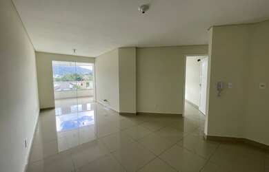 Imagem: O apartamento possui 2 Dormitórios, 1 Suíte, 2 Banheiros