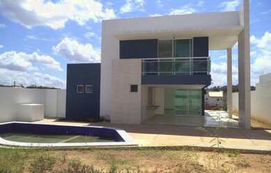 Imagem: A casa em condomínio possui 4 Dormitórios, 4 Suítes, 5 Banheiros