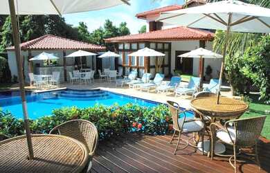 Imagem: A casa possui 6 Dormitórios, 3 Suítes, 7 Banheiros, 1 Vaga