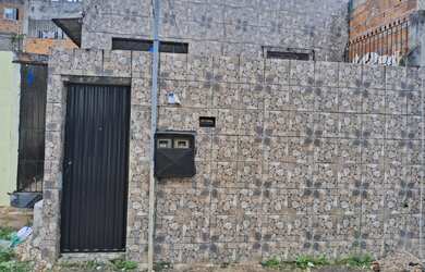 Imagem: A casa possui 3 Dormitórios, 2 Banheiros, 60m² de Área Privada